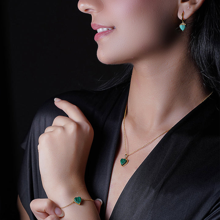 An image of Verdant Love's Malachite Heart Pendant, Hoop Earrings, Bracelet, Golden Chain With 10gm Silver Bar MMTC PAMP Gift Hamper.