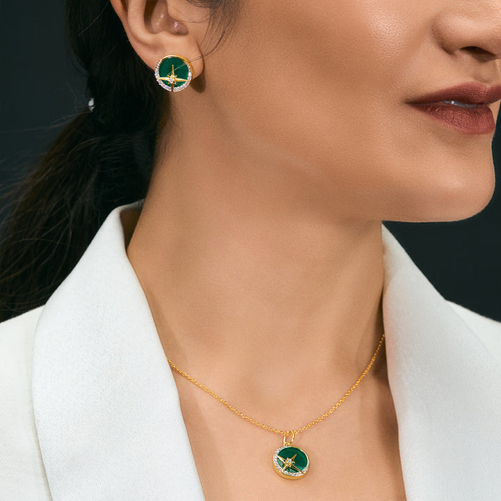 A woman wearing Star Pendant featured with Green Onyx and Cubic Zirconias.