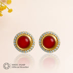 An image of Scarlet Sparkle Suite Red Onyx and Zircon Earring, Pendant, Bracelet with Golden Chain & 10gm Silver Bar MMTC PAMP Gift Hamper.