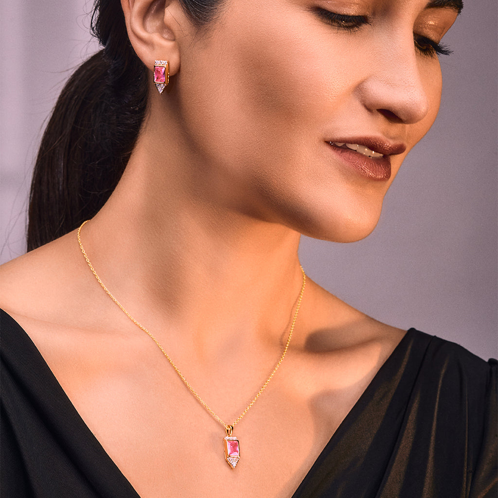An image of Radiant Pink Blushing Rose Elegance Golden Chain, Pendant, Earring With 10gm Silver Bar MMTC PAMP Gift Hamper.