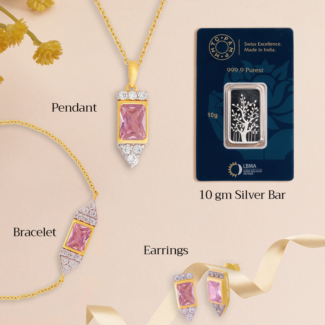 An image of Radiant Pink Blushing Rose Elegance Golden Chain, Pendant, Earring With 10gm Silver Bar MMTC PAMP Gift Hamper.