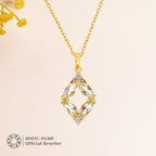 An image of Whispering Leaves Green Amethyst Ensemble Pendant, Earring with 10gm Silver Bar MMTC PAMP Gift Hamper.