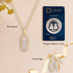 An image of Classic Beauty Mother of Pearl Delight Drop Earrings & Pendant with Golden Chain & 10gm Silver Coin MMTC PAMP Gift Hamper.