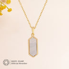 An image of Classic Beauty Mother of Pearl Delight Drop Earrings & Pendant with Golden Chain & 10gm Silver Coin MMTC PAMP Gift Hamper.