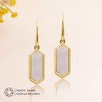 An image of Classic Beauty Mother of Pearl Delight Drop Earrings & Pendant with Golden Chain & 10gm Silver Coin MMTC PAMP Gift Hamper.