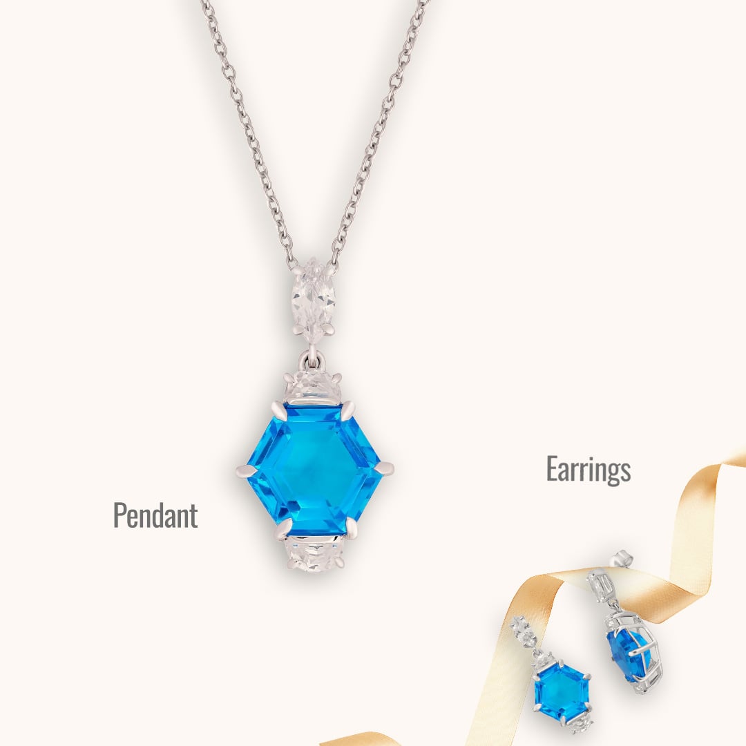 A Combo of Blue Gem Earrings and Pendant Set with Silver Chain.
