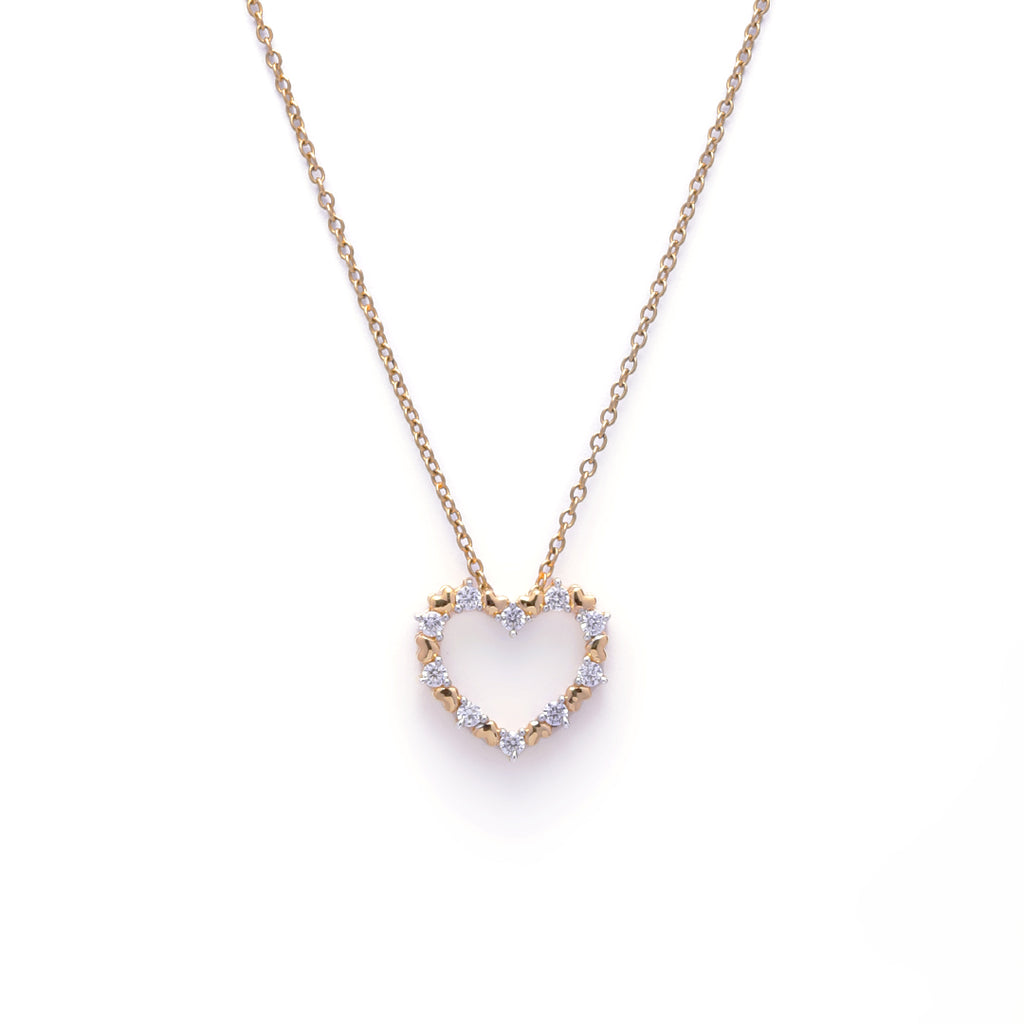 An image showing Dual Tone Heart Pendant in Gold and Silver Finish with Diamond Accents.