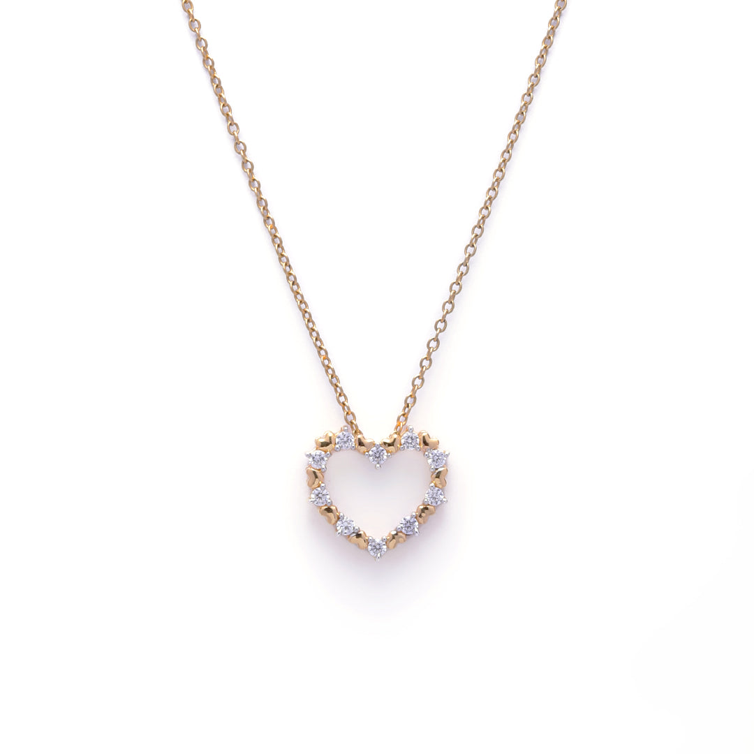 An image showing Dual Tone Heart Pendant in Gold and Silver Finish with Diamond Accents.