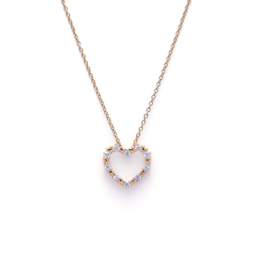 An image showing Dual Tone Heart Pendant in Gold and Silver Finish with Diamond Accents.