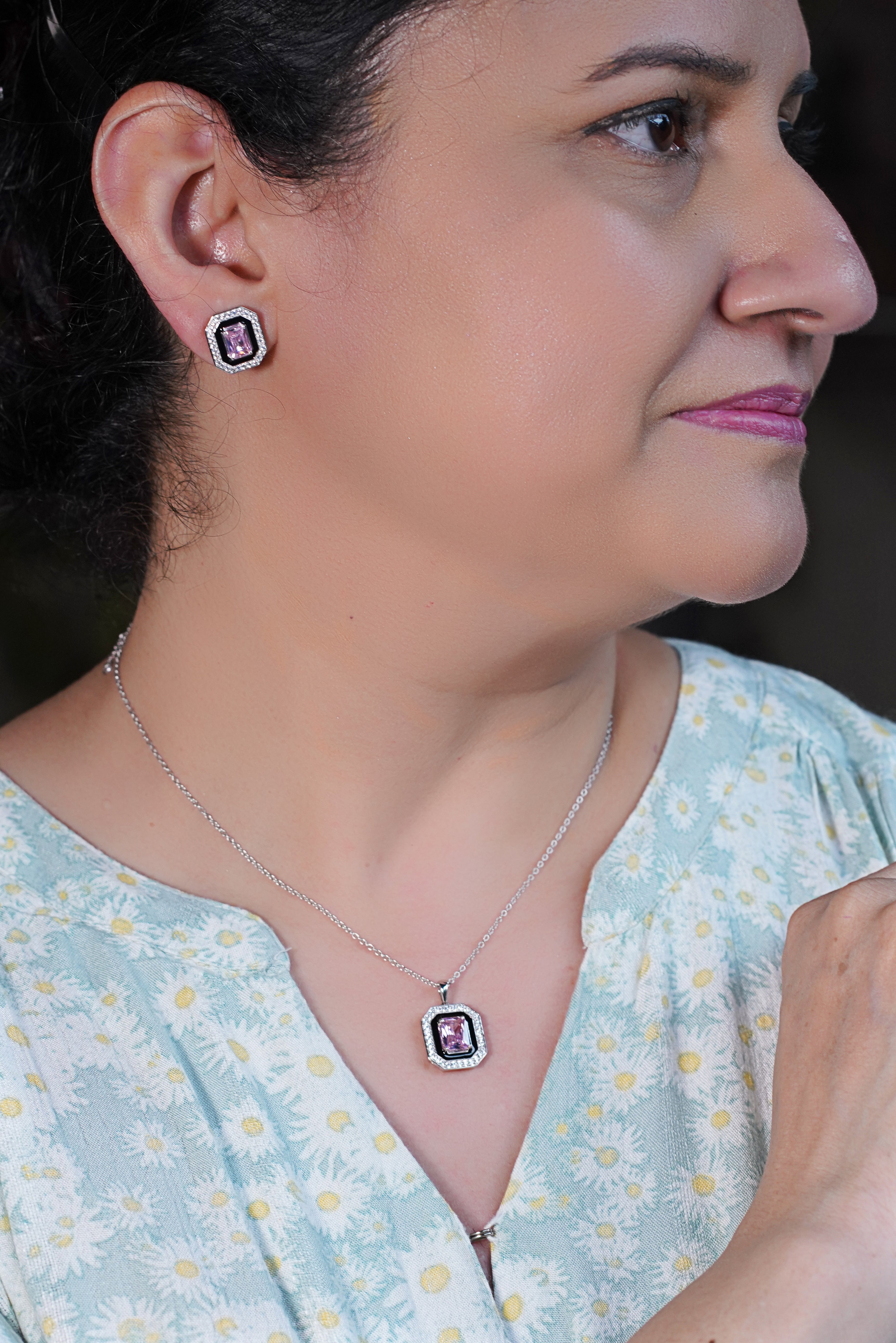A woman wearing Radiant Silver Serenity Chain.