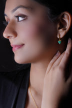 A woman wearing Malachite Silver Jewellery for Women.