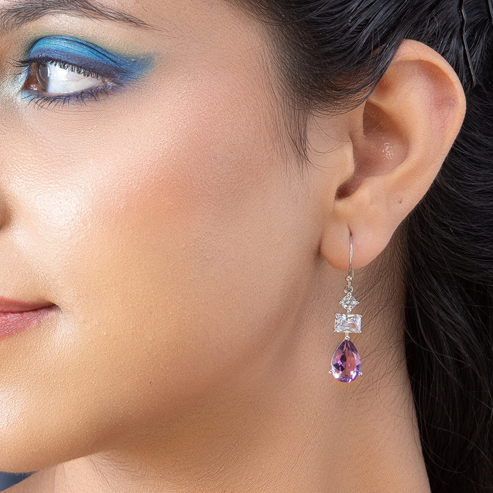 A woman wearing Lavender Amethyst Drop Earrings.