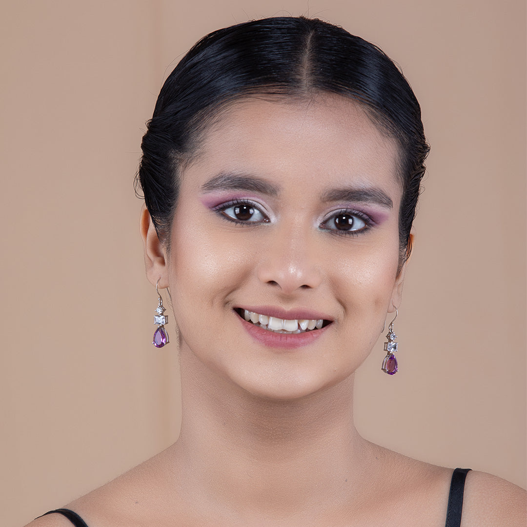 A woman wearing Lavender Amethyst Drop Earrings.