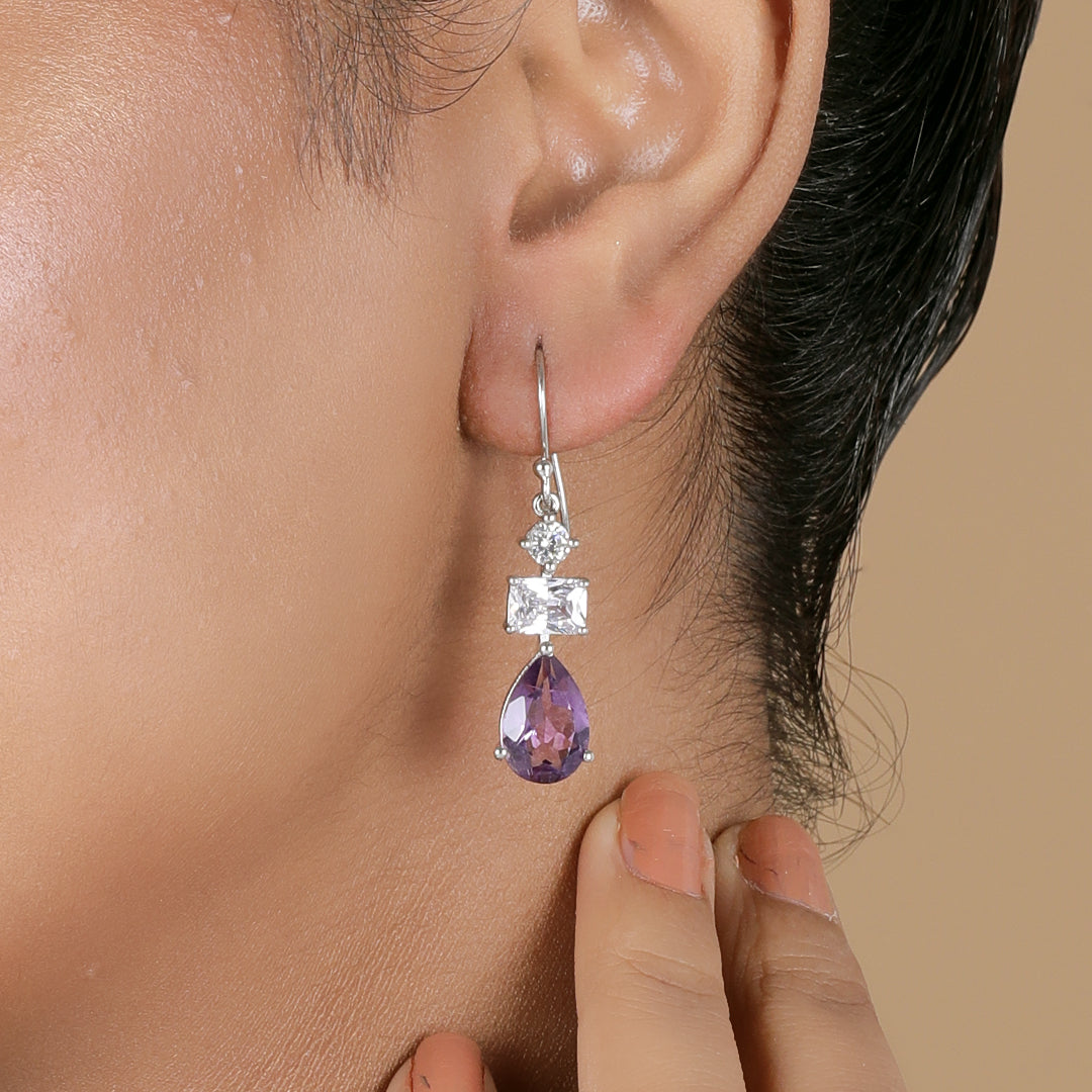 A woman wearing Lavender Amethyst Drop Earrings.