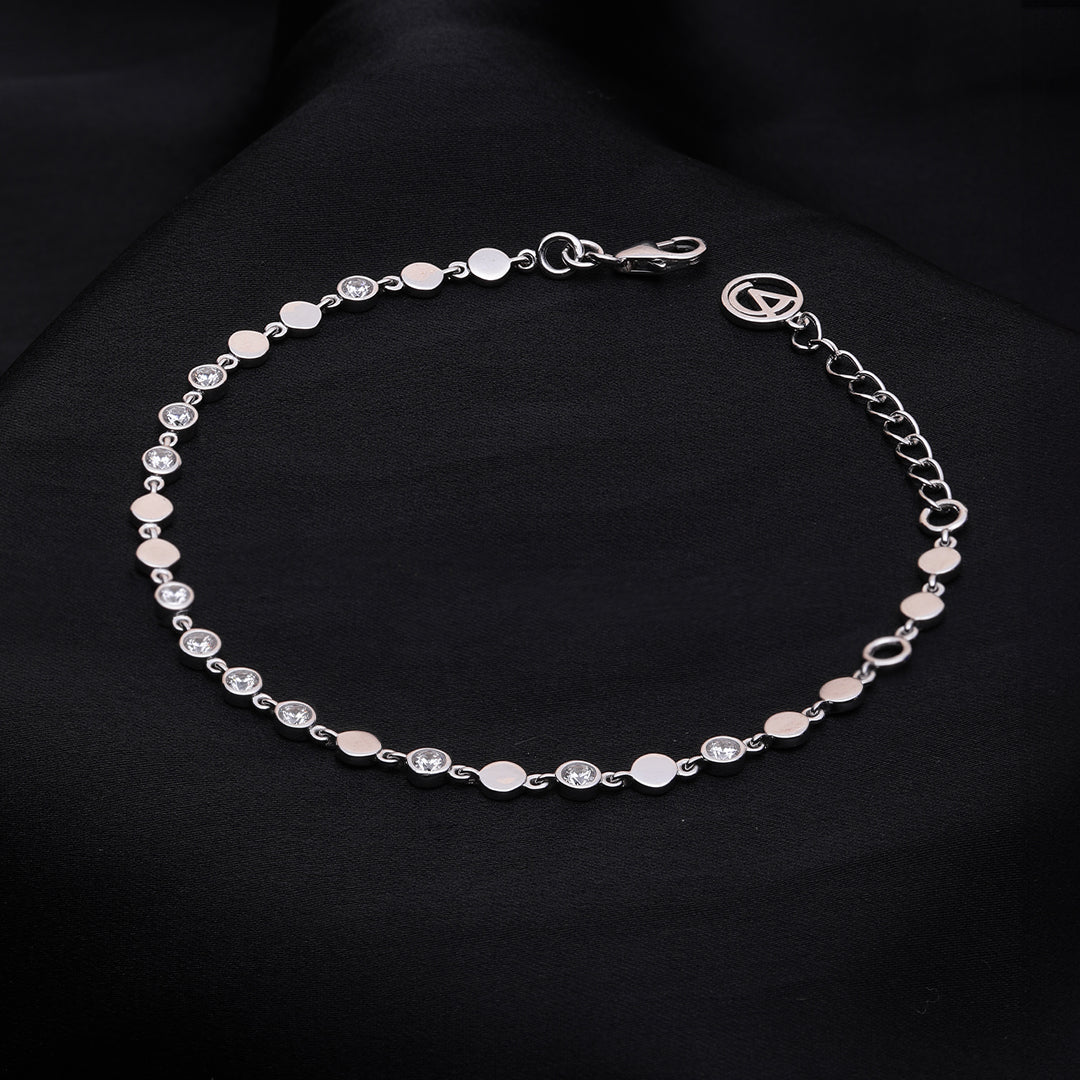 An image showing Elegant Silver Finish Tennis Bracelet with Diamond Accents.