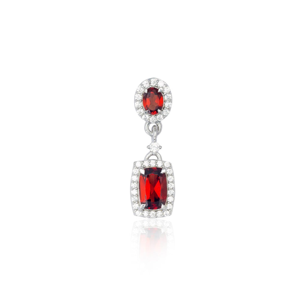 A Silver Pendant Adorned with Red Garnet and Cubic Zirconia.