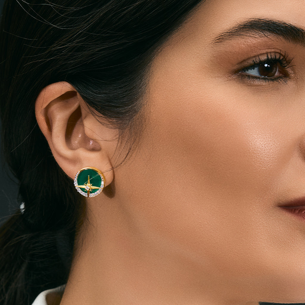 A woman wearing Mystic Green Galaxy Star Tops.